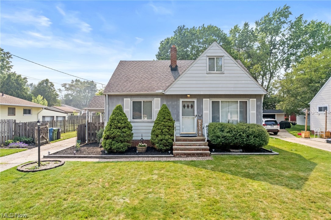 Welcome home to this beautiful, move in ready, cape cod/bungalow in a great pocket of Parma Heights. One can see the love and care that has been put into this gorgeous single family home. As you step into the front door, the large living room and first floor features fresh paint and fully redone hard wood floors that are to die for. The kitchen is updated boasting newer cabinets, hardware, updated appliances that all stay and plenty of storage space. Walking upstairs to the owners suite boasts newer carpet, spacious enough to fit a king sized bed, a nook for an office/powder area, etc. and plenty of storage for all of your needs. The basement features a half finished portion that can be turned into whatever your heart desires along with the surprise of another full bathroom! The fenced in backyard features a large driveway, 2 car garage and tons of room for all of your outdoor needs. One year home warranty included!!! Set your showings up for this gorgeous house today because it w