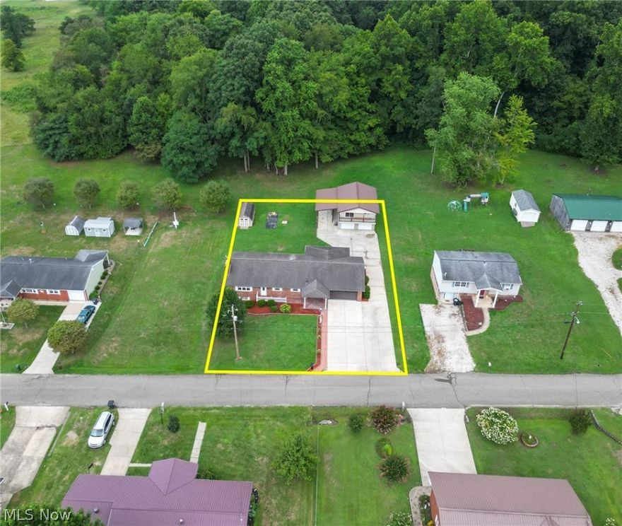 WOW, ONE OWNER!!  This 4 Bedroom 2 bath charming brick home, has so much to offer. From walking in the front door, you will notice the very large living room area, which connects to a beautiful open kitchen. Stepping down into the dining room which has two separate doors, gives you the opportunity to exit either the front or back of the home.   Wanting privacy? There are 3 bedrooms and 1 full bath upstairs and the master bedroom and a full bath is downstairs with penalty of extra room! Could also be great for a mother-in-law suite too.  The laundry/mud room area is great with a walk out basement for easy access to the outside.  Newer improvements are HVAC system, hot water tank and so much more.  26 X 24 detached two car garage with an above area that could be used for extra space, man cave or updated for extra living space.  Lean to attached to garage to store your boat, motorhome or all your play toys.  To top it off all this area from street to garage is a concrete driveway. Full house generator. This very well-kept home is situated on a level beautifully landscaped yard, located close to the end of a cul-de-sac.  No need to wait, this move-in ready home is waiting for you!!  Call today to schedule your appointment.