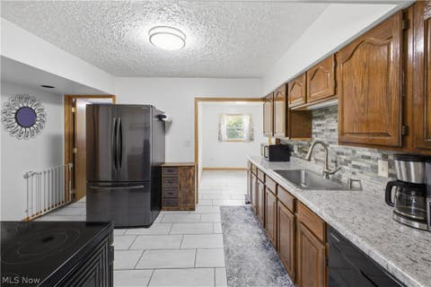 Tiny photo for 1057 Center Road, Clinton, OH 44216 (MLS # 5239602)