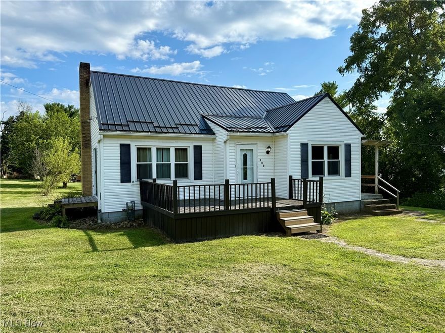 Nestled in a quiet neighborhood on just over half an acre right in Hopedale, this 3-bedroom, 1-bathroom home offers classic character and great potential. Step inside to find original woodwork, beautiful built-ins, and generously sized rooms throughout.

On the main level, you'll walk in the front door to a large living room, dining room, 2 bedrooms, and a full bathroom, Upstairs, you'll find a unique 3rd bedroom that is captured-you need to walk through one bedroom to get to this bonus room, which would be perfect for a home office, guest space, or creative studio. The updated kitchen brings some modern convenience while maintaining the home’s vintage charm as well!

Enjoy the privacy and space of a large double flat lot, ideal for gardening, entertaining, or future expansion. The home also features a newer metal roof, low-maintenance vinyl siding, and all the charm of a quiet Hopedale location. With minor updating, this home can truly shine. Owners are unsure if they own mineral rights-Whatever is owned will transfer.

Don’t miss this opportunity to bring your vision to life in a home full of potential!