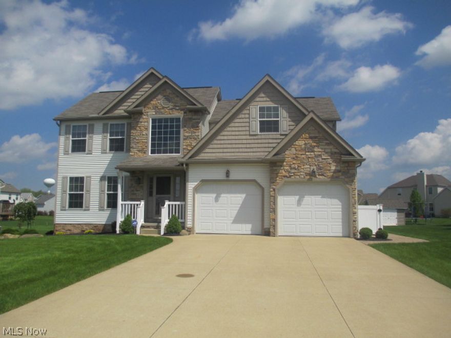 This is an awesome Colonial in Heritage Glen w/many upgrades.  This one has 4 BR, 2.5 BA and a finished basement.  Many updates in 2012 including finished basement, new flooring, granite counters in kitchen and baths, stainless steel appliances and back deck/patio.  First floor has an open floor plan w/sun room and a slider that leads to back deck/patio.  Back deck is large and maintenance free. There is also a patio off deck w/built-in fire pit. If you are looking for an awesome outdoor space, this is it!  Master BR is 18 x 15 and has walk-in closet, master bath w/double sinks and has a newer tile floor.  This one not only looks great in the pictures but even better in person.  Heritage Glen is located in the Lake Local Schools and has sidewalks, lighted streets and a stocked pond for fishing.