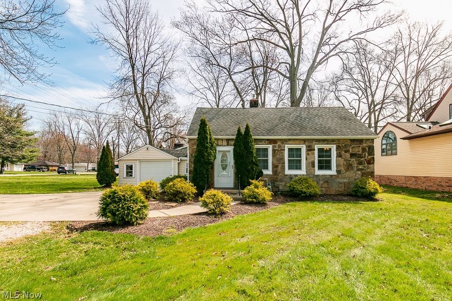 If you are looking to break into one of Cleveland's premier suburbs and school districts at an amazing price point, look no more! This move in ready, fully updated, cottage style house sitting on a generously sized lot awaits you. Pulling up to the property you will notice a convenient double drive with access from Dover Center and adjacent Rose Rd allowing you to never back onto either street when exiting. The curb appeal shines with beautiful stone siding and lush landscaping up front. In the back you will find a covered patio perfect for entertaining on those warm summer days or relaxing after a long day of work. Through the back patio door, you will find an amply sized dining space with a large picture window overlooking the backyard. Down the hall you will find a private utility room with washer/dryer, the first of three bedrooms, and a full updated bath with a high ceiling. Back around the corner the galley style kitchen offers stainless steel appliances, beautiful backsplash, and neutral colors on both cabinets and walls. Adjacent the kitchen is a  spacious living room bursting with natural light as the space is equipped with three beautiful windows. Conjoining this space are the remaining two bedrooms all of which have newer carpeting and ceiling fans. This property sits almost equal distance from Crocker Park and Great Northern Mall. It really cannot be beat in both price and location! Book your showing fast, as this one will surely not last!