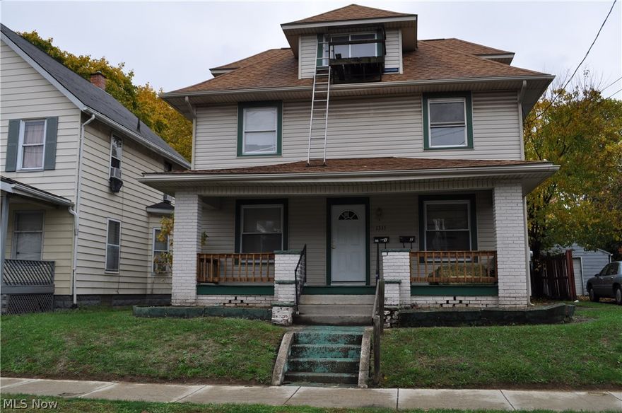 Spacious duplex is move in ready condition.  The main floor unit offers huge living/dining room combination, 2 full baths and 2-3 bedrooms.  The upstairs unit provides 3 bedrooms, 2nd & 3rd floor living space  plus applianced kitchen.   Each tenant may be provided with garage space, as there is a two car garage.  There is some brand new carpet.  The bedroom closets are quite roomy.  Long term tenant history, now your turn to grow your portfolio.