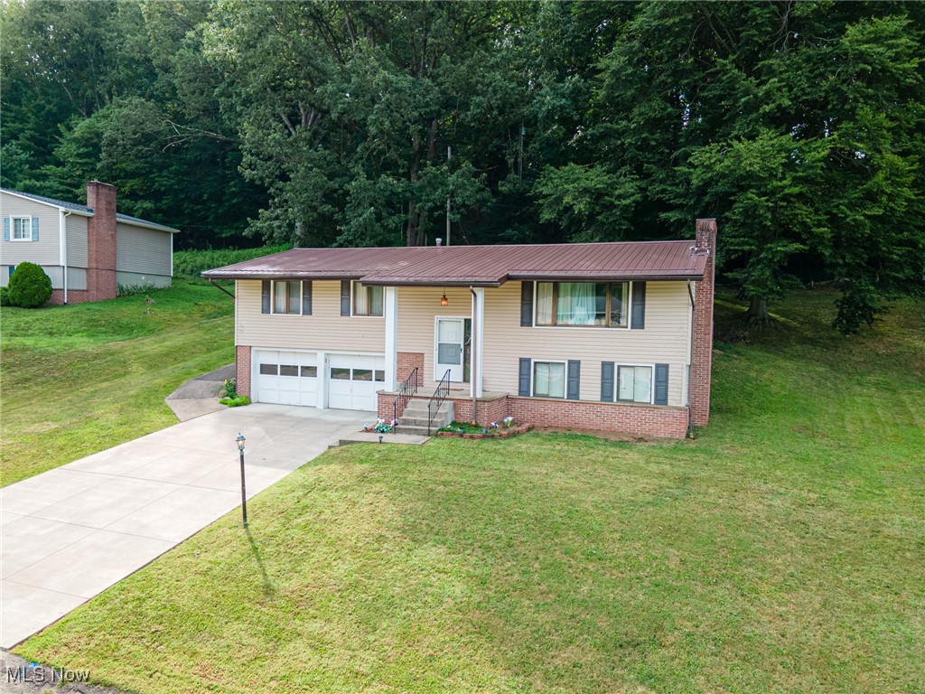 Welcome to 1781 Buena Vista Dr in Coshocton. A roomy raised ranch with ample space and great location just 2 minutes from the Coshocton City Schools campus. With 1900 square feet of finished living space, this 3 possibly 4 bedroom, 2.5 bath home has plenty of room for just about any lifestyle. The main floor offers 2 full bathrooms and 3 nicely sized bedrooms, one of those having its own en suite full bathroom. In the fully finished lower level you'll enjoy a nice living room, a half bath and laundry room and access to the 2-car garage. The roof was replaced about 5 years ago, so that's a major item that will be worry free for many years.