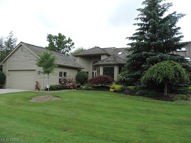 Dramatic two story foyer. Stunning hardwood floors. This pristine home is decorated with today's colors & style throughout. Wonderful natural sunlight and walls of windows throughout. Gourmet kitchen with large island & eating area. Bay window in Living room opens to the dining room with soaring ceilings and floor to ceiling windows and a stunning stone fireplace wall. The family room has a full bath off it & could be a 2nd first floor bedroom. Fabulous 1st floor master suite with high ceiling, a dressing table area, walk in closet & lovely glamour bath w/another den which could be an office or exercise room off master. Upstairs is roomy with a loft, large bedroom & full bath. Very inviting finished rec room & tons of storage in this full basement. Walk to Beachwood Place, LaPlaca & Legacy Village. Close to hospitals, universities & museums. Enjoy the pool, tennis, exercise room & party room of this great gated community. Home Warranty!