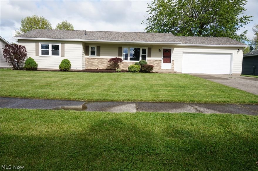 Don't miss this newly updated Ranch located in a neighborhood of well-maintained homes. Kitchen features granite countertops, gorgeous glass tile backsplash, ample cabinet space, and stainless steel appliances. Living room has large window to let in plenty of natural sunlight. Luxury vinyl tile throughout with new carpet in bedrooms. Main bath offers tile tub surround, new vanity, and shiplap accent wall. Eat-in kitchen with sliding glass doors to large covered deck perfect for entertaining family & loved ones. Roof, hot water tank, furnace, and A/C brand new in '20. Attached garage with opener and storage shed in freshly landscaped backyard. Call today for a private showing.