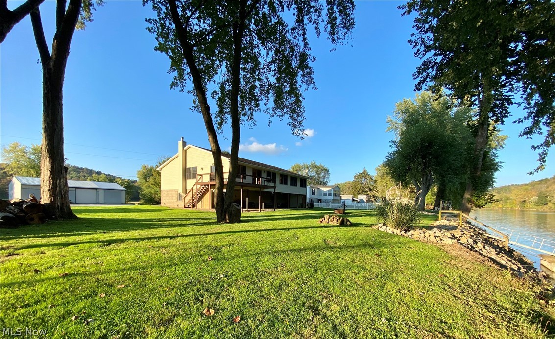 *SPRING INTO SUMMER SALE!!* Come see this remarkable riverfront property with breathtaking views of the Muskingum River!! This beautiful ONE OWNER HOME sits on 3 lots equaling 1.419 acres. 2 bed, 2 1/2 bath with main floor laundry. There is a 12x12 office on the main level that could easily be converted into a third bedroom. Beautiful solid oak floors throughout. Newer stainless steel appliances, built-in double oven, microwave, and cooktop. 1/2 bath located on lower level. Home is heated with propane fuel, and has a wood burning furnace that heats the whole main level.
38x74 pole barn/garage with ample storage space for all your toys!
This truly is a property that keeps on giving! Schedule your showing today!
