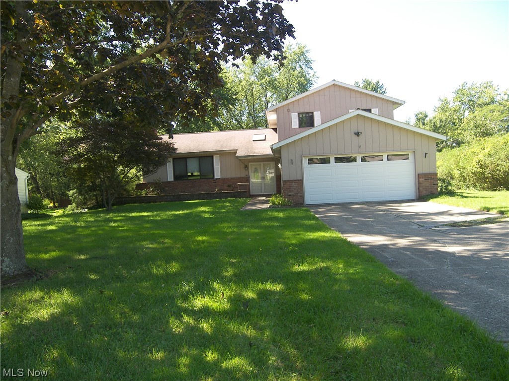 Well over 2000 sq. ft. of living area in this split level on 1.38 acres * Freshly painted interior & new carpeting * Updated kitchen cabinetry, granite counters & tiled backsplash * Appliances stay * Spacious family rm. has WBFP, wet bar w/plenty of shelving & 8 pocket lights * 4 baths total, 3 are upgraded * 4th bdrm. or office on 1st flr. * 5 ceiling fans * 2 Pella bow windows * Sklylite above foyer w/premium entry doors * Lower level has a full bath w/slider to a large patio w/Arbor overhead & flower garden beyond * Generous storage is in concrete crawl, above garage & the 2nd flr. of outbuilding 2/staircase, concrete flr., workbench & fluorescent lighting * Updated breaker panel & A/C condenser 2018 * A portion of backyard is fully enclosed w/privacy fencing *