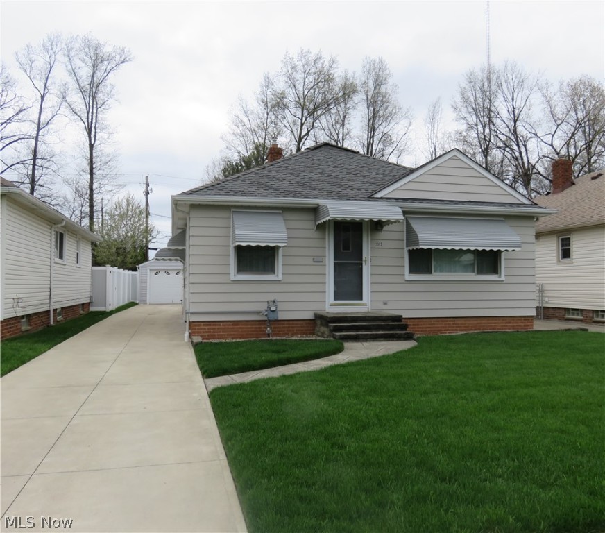 Welcome to this charming, remodeled Ranch located in Parma. This home has undergone significant updates, including a driveway, outside awnings, remodeled kitchen and baths, an updated furnace, and an A/C unit.
The kitchen and dining space have been tastefully remodeled and are perfect for entertaining. The kitchen features extra cabinets and counter space. The dining room area is accompanied by the same. The three spacious bedrooms share a fully updated bathroom surrounded by beautiful tilework and a lovely vanity. The partially updated finished basement offers a beautiful recreation space, glass block windows with vents, and lighting with a full bath for guests to use after they leave your gorgeous 15x30 oval, heated pool. There is unfinished space for storage and a laundry area. Outside is a composite deck that adjoins the pool, surrounded by a beautiful white vinyl fence for privacy and a security gate. A detached one-car garage has additional external storage space and a backyard shed. Make this your own today, just in time for summer.