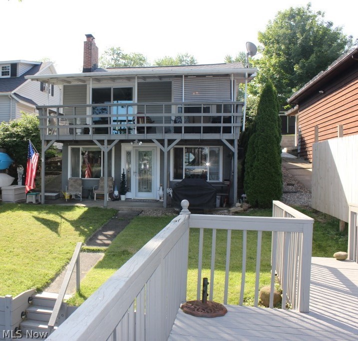 Adorable lakefront ranch with phenomenal views, 2-3 bedrooms, 2 baths, approx. 1450SF including walkout lower level, 2 car garage & a magnificent deck over the water* Starting with 3 season sun room (updated) having access to entry/kitchen area* The remodeled kitchen having granite counter tops, pantry, stainless refrigerator, dishwasher and a movable island* Great room with window wall including slider to balcony overlooking lake, gas log fireplace & wood floor* 2 bedrooms & 2 updated bathrooms complete the first floor* Walkout lower level includes family room with slider to covered patio overlooking lake, free standing bar, office or bedroom for guest with large window with lake view & partial bath -- a great entertaining area* Other updates over the past few years, but not limited too, windows & doors, shingles, siding, furnace (4 yrs.), electrical, dishwasher (2 yrs.), & garage shingles (5 yrs.)* Concrete sea wall with dock* Private well, public sewer* Great value on Portage La