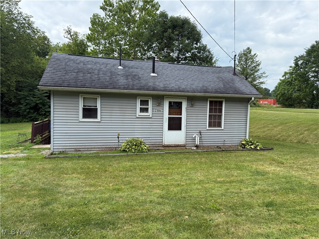 Charming two-bedroom home with country appeal on three lots! Enjoy a touch of country living in this ranch home nestled in a quiet neighborhood, but close to all amenities. The main floor features a welcoming living room, an eat-in kitchen perfect for family meals or entertaining, two comfortable bedrooms and a full bath. Head downstairs to the basement, where you'll find a comfortable family room and a convenient laundry area. Appliances are included — refrigerator, stove, washer, and dryer — making this home move-in ready. Step outside and explore the generous yard that extends all the way to the ravine, offering beautiful scenery and endless possibilities for gardening, recreation, or expansion. Whether you're looking for a peaceful retreat or room to grow, this property has it all!
