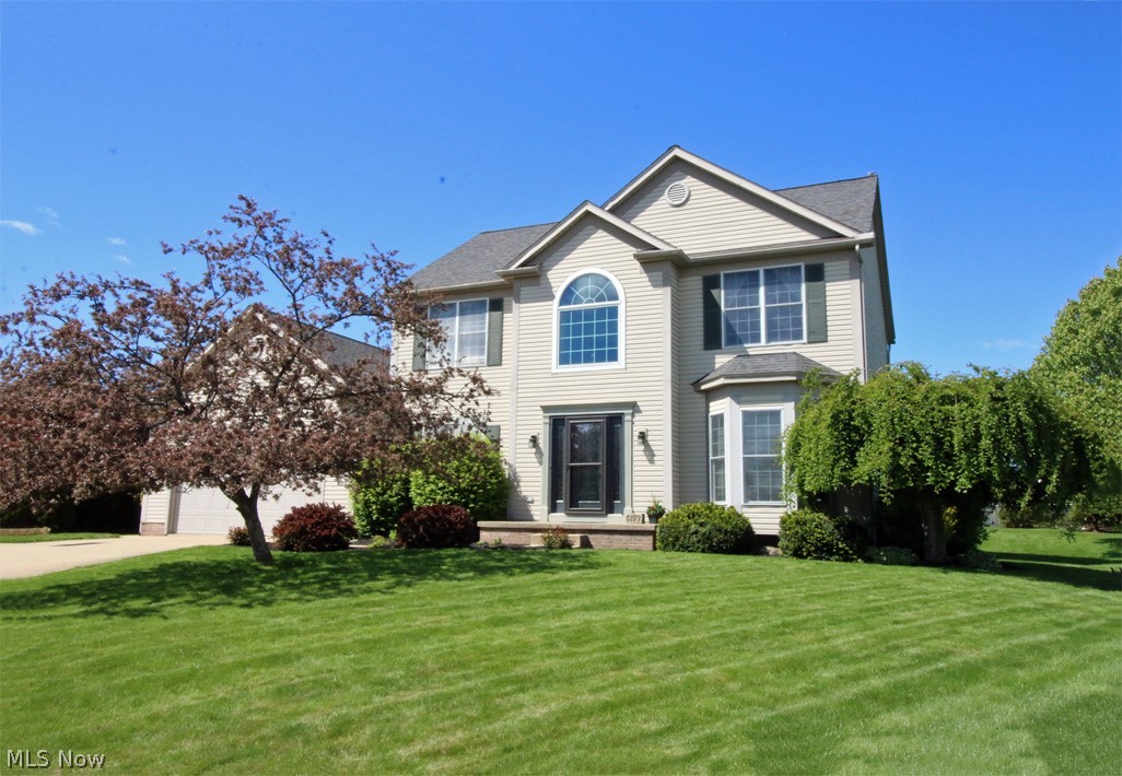 Fabulous & spacious cul-de-sac lot located in the highly desirable neighborhood of Bayside Lakes in Stow. This area is absolutely one of the prettiest neighborhoods & has direct access to the Metro Bike/Hike Trail connecting to over 50 miles of beautiful, scenic trails. This home has been lovingly cared for & well maintained. Upon approaching the front door, you will notice the lovely front door w/leaded glass that was replaced in 2019. Off the foyer is the formal living room w/bay window, a turned staircase leading to the 2nd floor & 1st floor office. Leading to the back of the home is a large dining room, remodeled kitchen (2017) boasting a spacious center island, white cabinetry, & granite countertops. The kitchen opens to the oversized great room w/fireplace. The great room has a vaulted ceiling and the first floor has 9 foot ceilings. 1st floor laundry. The kitchen & great room have hand-scraped acacia wood laminate flooring. At the rear of the home is a great place to relax & enj