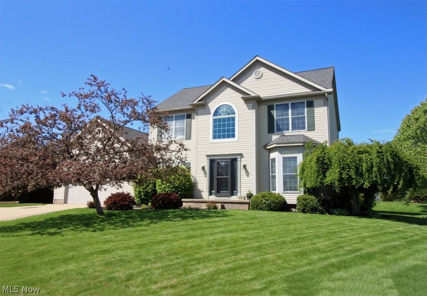 Fabulous & spacious cul-de-sac lot located in the highly desirable neighborhood of Bayside Lakes in Stow. This area is absolutely one of the prettiest neighborhoods & has direct access to the Metro Bike/Hike Trail connecting to over 50 miles of beautiful, scenic trails. This home has been lovingly cared for & well maintained. Upon approaching the front door, you will notice the lovely front door w/leaded glass that was replaced in 2019. Off the foyer is the formal living room w/bay window, a turned staircase leading to the 2nd floor & 1st floor office. Leading to the back of the home is a large dining room, remodeled kitchen (2017) boasting a spacious center island, white cabinetry, & granite countertops. The kitchen opens to the oversized great room w/fireplace. The great room has a vaulted ceiling and the first floor has 9 foot ceilings. 1st floor laundry. The kitchen & great room have hand-scraped acacia wood laminate flooring. At the rear of the home is a great place to relax & enj