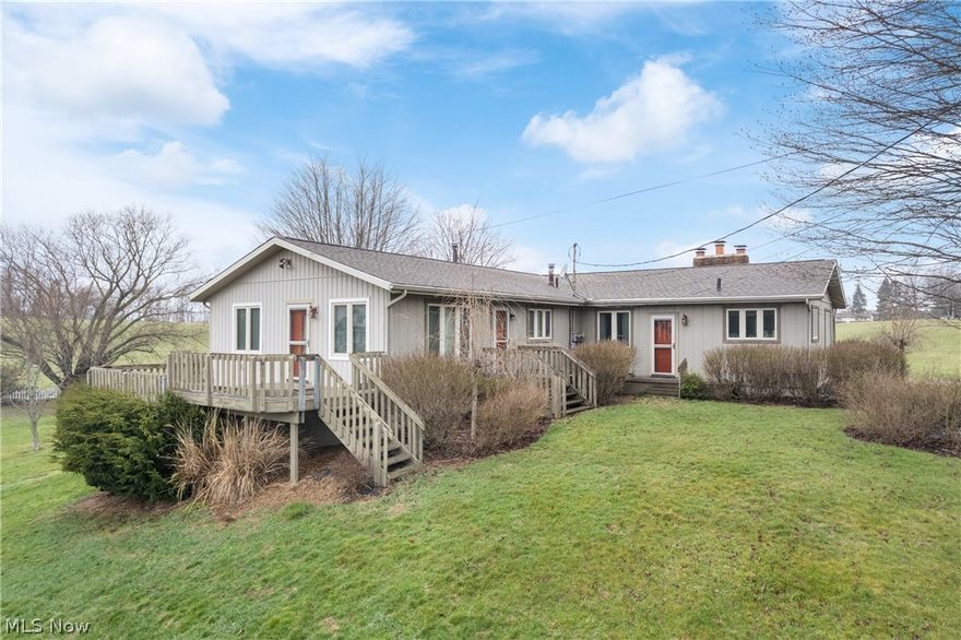 Check out this amazing duplex located on almost one acre in the top rated Green Local School District. Well maintained by the original owner and features a great design for owner occupied with in-law suite, extra income, or investor owned opportunity. The larger unit has new carpet and features 3 bedrooms, 2 full baths, large living room with brick fireplace and good sized kitchen. Basement is also finished with another fireplace, utility area and walks out to a 2 car attached garage. Plenty of space for a family or max rental potential. The other unit has a large living room, kitchen, two bedrooms and full bath. The lower level is finished with rec room, laundry area and walks out to a one car attached garage. This side has been well maintained by long term tenant of 18+ years on a month to month lease. The property has updated roof, A/C units, vinyl windows and hot water tanks. There is a shed for extra storage. Each side has separate entrances, utilities, and decks with amazing views of the rolling hills behind the property. This one will make a great investment or a great house to call HOME!