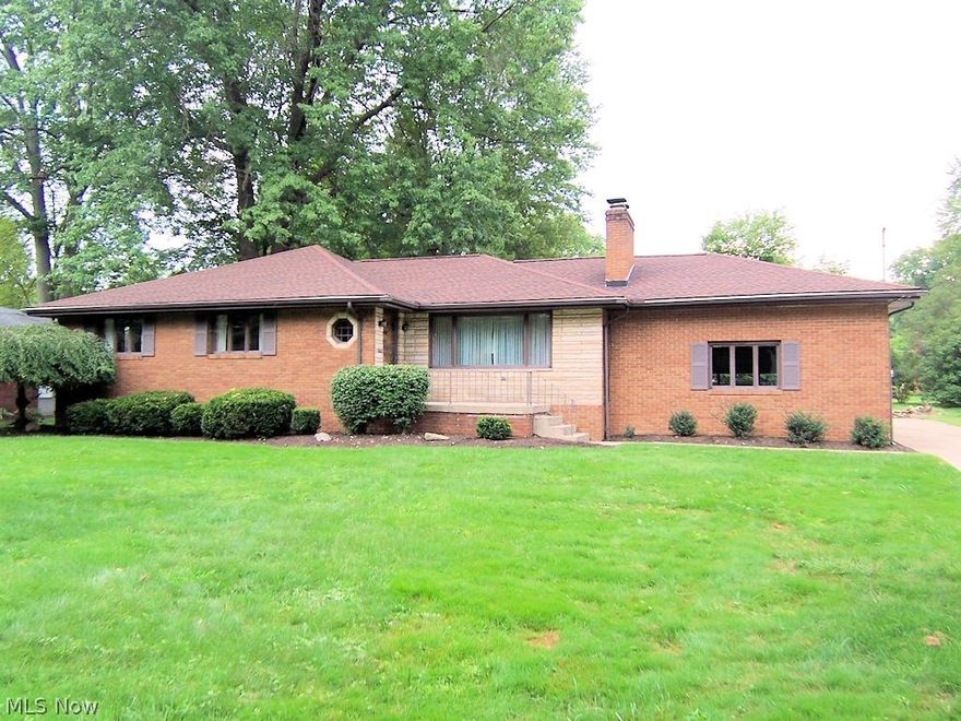 Its not very often that you will find a ranch style home available in this conveniently located neighborhood!  This 3 bedroom home features a large lving room with a fireplace and new carpeting, a formal dining room, 12 month sunroom with brand new carpeting, eat in kitchen and 3 full baths including one in the master bedroom.  The third full bath is located in the basement which also includes a second fireplace and is divided off for a recreation room.  The home is all brick and the roof is newer.  The furnace and central air condtioning are approx. 6 years old.  Laundry is located in the basement.  The double attached garage features rear entry and there's plenty of parking.  The kitchen includes all appliances except a refrigerator.  This well cared for home sits on a 80x187 treed lot and is within walking distance to Mill Creek Park. Three panels of driveway in front of garage door and next to rear steps were leveled by A1 Concrete Leveling in September.