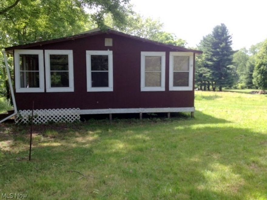 Canton South home has been freshly painted inside in every room (even the floors).  Well and Septic, sellers were getting ready to put stackable washer and dryer on first floor.  Pipes in great condition with all repairs recently made, front room recently wired.  Current owner is leaving drywall, insulation, widows and front door they bought for this home prior to their decision to sell.  This makes it easy to flip, use as a rental (current owners received $600 per month with long tenant history), live in it while you build your dream home ~ your only limitation is your imagination.   This 2 acre lot stretches to Rt 43 and comes complete with pole building.  Horses permitted.