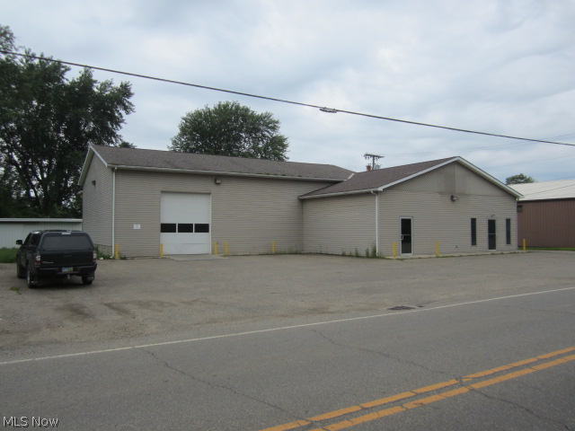 Three Buildings and lot on .48 acres, Otsego Ave. for sale. Built in 2004, this 4000 sq. ft. building is in excellent condition. 4 large bay doors, high ceiling, restroom, office, lots of storage, heated, inside finished with painted metal. Truck doors, man doors, outside pads, plus 2 pole bldgs, parking. This building can be used for multiple purposes.