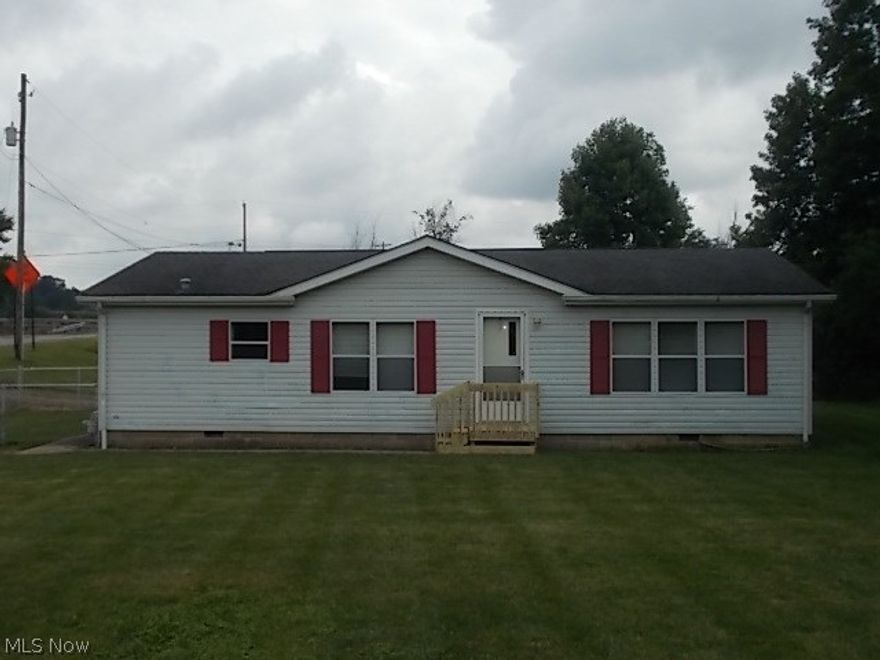 You'll love this charming 3 bedroom, 2 bath ranch on a little over an acre in a great location. Nice kitchen, dining room and large living room! Roomy 2 car detached garage. All the comforts of country living, but in a convenient location with easy access to Rt. 40 and Interstate 70.