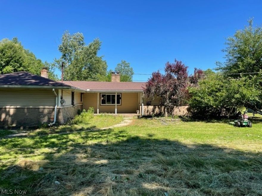 4 Bedroom 2 Bath Ranch surrounded by 55.68 acres located in Mesopotamia Twp. 2 car attached garage.  Free gas to home and mineral rights transfer.