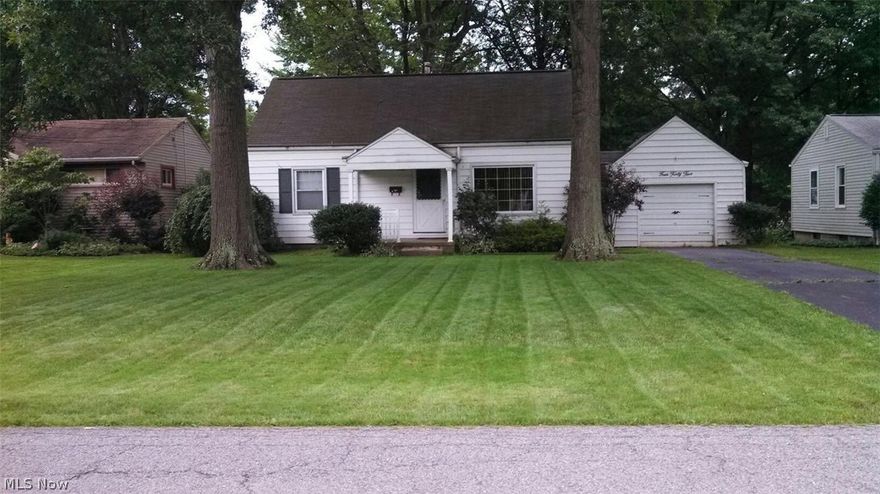 Charming 4 BR Cape Cod on Side Street Treed Lot near Fairgrounds.  Beautiful Cherry Kitchen  cabinets with appliances.  Nice Rec Room with finished office.  Immediate occupancy.