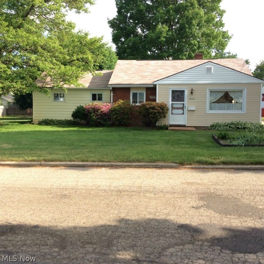This Ranch is located on a Double Lot. Just updated in April-May 2015. Siding replaced on house and garage gable ends. Freshly painted throughout. New light fixtures throughout. kitchen updated with cabinetry, countertops, faucet and flooring. Bathroom has been renovated including new cabinet, countertop, mirror and flooring. Electric line from house to garage has been replaced and new circuit breaker installed in garage workshop. New carpet throughout house. You will find a large Living and Dining area with Newer Windows throughout the home. You will also find an Updated Roof and Furnace. The Kitchen overlooks a beautiful backyard. Oversized Garage with a Workshop. (Square footage includes finished attic.) today to schedule a showing.