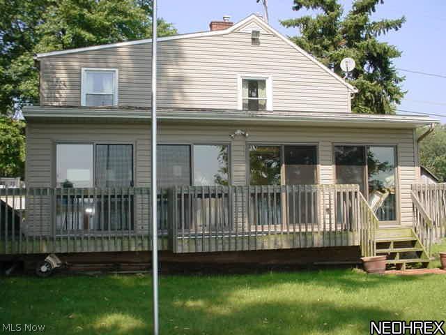 Springfield Lakefront property! Owns out into water! Keep your boat at your house! 2008 heated 30x12 sun room w/wrap around deck overlooking the lake! 3 bed, 1 1/2 bath, gas fireplace! 2008 vinyl siding & roof, 2006 new septic system, 2003 breaker box, 2001 windows, 1999 furnace. Boat, fish, swim, ski,skate,enjoy! Chair lift & ramp. Dock needs repaired. Rare find!