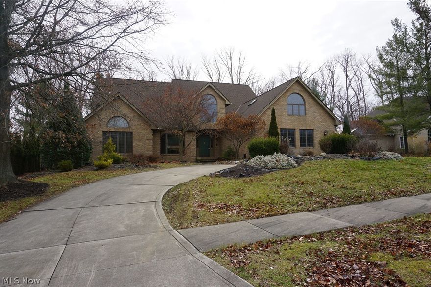 If you are looking for a sprawling home with tons of space for all your living and entertaining needs plus a first floor master, then this is the home for you. Enjoy the many upgrades this home has to offer like the gorgeous granite counter tops, solid wood floors in many rooms, irrigation/sprinkler system, security system, large deck, covered patio, whole house intercom system, and the 3-car heated garage with water that allows you to wash your cars year round! The eat-in kitchen with oversized island has a massive storage pantry and overlooks the private scenic back yard. The massive great room has a vaulted ceiling and a fireplace for cold Ohio winters plus a wet bar. A formal dining room provides more space for entertaining, and the only word to describe the library would be exquisite. The owners suite has an oversized master bath and his and hers walk in closets. There is a large office located on the 2nd floor and also four additional large bedrooms that have custom privacy blind