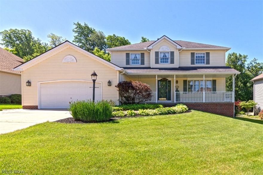 Move right in to this meticulously maintained colonial that is convenient to everything you need in Seven Hills! This charming home provides 2,386 square feet of living space with an open, inviting layout and a picturesque back yard and deck; it is just waiting for you! Illuminated by a picture window, the living room is open to the formal dining room, perfect for entertaining. The kitchen features an island, crisp white cabinetry, and an eat-in area with sliders that open to the deck, so you can easily take meals right outside. Off of the kitchen, there is a step down family room with a floor-to-ceiling brick hearth fireplace. On the first floor, you will also find a full bathroom and a convenient laundry room with a newer washer and dryer. Upstairs, the master suite includes a walk-in closet and a private en-suite bath. Three bedrooms and a hall bathroom with a skylight complete the second floor. The full lower level provides plenty of room for storage, and could be finished into you