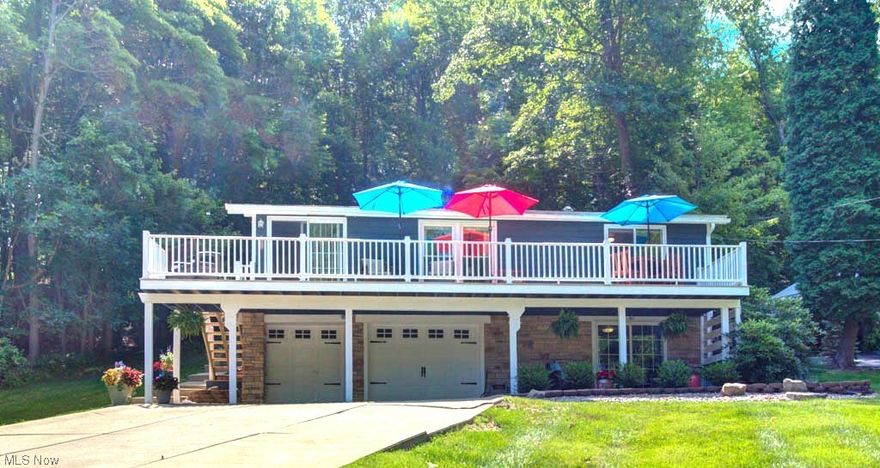 Welcome to your lakeside oasis! This beautifully remodeled 2-bedroom, 1-bathroom lake house offers the perfect blend of classic charm and modern convenience. Step inside this lovingly lake house, and you'll be greeted by an inviting open floor plan that seamlessly combines the living, dining, and kitchen areas. Natural light pours in through large windows, highlighting the tasteful finishes and contemporary design throughout. The spacious deck is perfect for outdoor gatherings, barbecues, or simply lounging in the sun. The lower level offers finished areas and also walks out to a patio area. Nestled in a serene setting with easy access to the docking area. Roof was new in 2021, deck was new in 2019, furnace and ac new in 2017 or 2018. Lake Mohawk is a private gated community with a 500 acre unlimited horsepower lake, 3 beaches, executive 9 hole golf course, tennis/pickleball courts, clubhouse and much more.