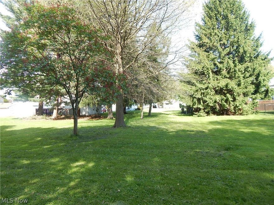 Quiet street offering one to four city building lots. City of Akron Tax abatement question should contact the city of Akron. 
Level land with great opportunities.