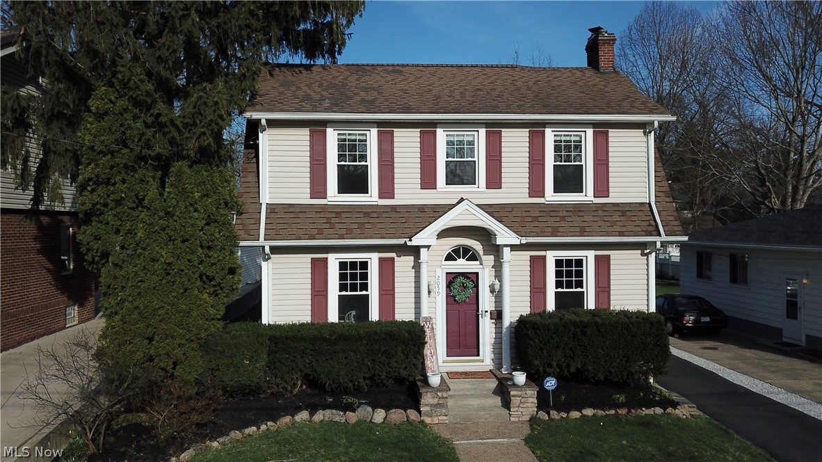 Welcome to 2059 8th Street! Just a short walk to downtown and all the shops and restaurants. Close to the YMCA and City Parks. The classic colonial features original oak hardwoods in flooring and trim. The large living room has many windows for natural light and a brick fireplace with gas logs. There's a wide/arched opening into the dining room. The kitchen features maple cabinetry, slate backsplash, granite counter tops, stainless steel under mount sink, professional spring gooseneck faucet, stainless steel appliances including a gas stove, French door refrigerator and built in microwave. The nice back yard features a low maintenance deck. Ample parking with a long driveway and a large 2 car garage. Upstairs bath is updated and includes a large soaking tub, ceramic tile/heated floors. The lower level includes a large room with several closets. The lower level bathroom has been updated with ceramic tile floors and ceramic tile stall shower. Washer, Dryer and home warranty