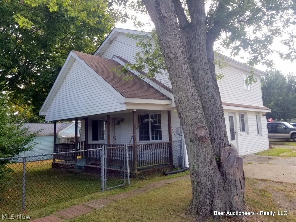 This is a nice 2 story home with 1620 sq. ft. It has a large kitchen with oak cupboards, formal dining room, living room, full bath and spare room on the first floor. The second floor has 3 bedrooms and a full bath. There is a full basement with natural gas heat and newer electric service. The home has vinyl siding, shingle roof and a fenced in yard. All situated on two city lots in the LaCroft area of East Liverpool.