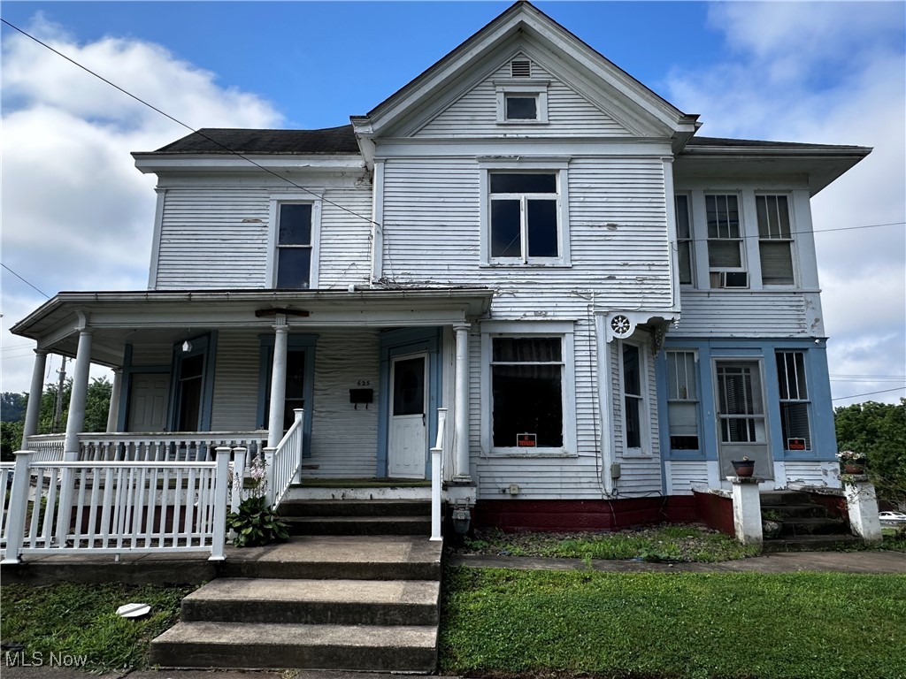 INVESTORS & FLIPPERS, here is a great opportunity on this 2-story Victorian home with PLENTY of room to spread out. With a main level with beautiful original woodwork and pocket doors to the front room, a main floor room that could be a bedroom or office, and a large sunroom for those peaceful mornings with a cup of coffee, or enjoy the covered front porch. While going up the beautiful staircase, you will see the beautiful wood detail doors and find 4 bedrooms, a full bath, and a kitchen! Past history of the home was a duplex at one time, and the upstairs has an additional entrance still there. The basement is divided into different rooms with remnants of an old kitchen still there, as well as the washer and dryer hookups. The walk-out basement offers a covered back patio to enjoy in the backyard. There is a barn in the backyard with an attached shed. This home offers endless possibilities for a large single family or bring your new ideas and vision to life! The roof is approximately 15 yrs old, and this is an AS-IS property and priced to sell. CALL for your showing!!