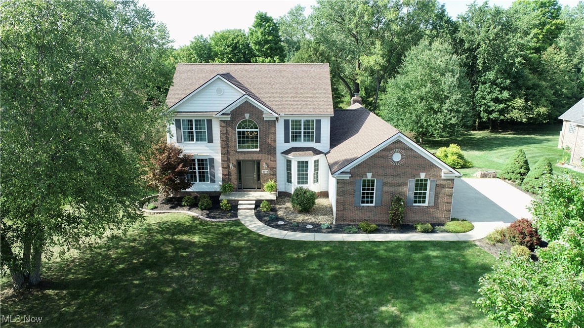 They say home is where the heart is — and your heart may just find its way to 2275 Autumn Creek Path in Valley City, Ohio. This charming, single-owner 3-bedroom colonial is now accepting offers to welcome its next caring owner. If chosen, you'll inherit a home filled with love and happiness, crafted by the current owners in a prime location.
Nestled in a peaceful cul-de-sac, this residence offers a welcoming concrete driveway leading to a spacious 3-car garage. Step inside through the front door into a bright, open foyer. To the left, you'll find a comfortable living room, while on the right is a private office space. Continue through the living area to discover a generous formal dining room, perfect for gatherings.
The open eat-in kitchen features Corian countertops and a center island, seamlessly flowing into the cozy family room with a fireplace—ideal for relaxing evenings. A convenient first-floor laundry completes the main level.
Upstairs, you'll find all three bedrooms. Two additional bedrooms are complemented by an updated full bathroom. The master suite offers ample space, a walk-in closet, and a beautiful ensuite bathroom. The unfinished basement presents a blank canvas for your ideas and provides plenty of storage and workspace.
Step outside to your newly renovated deck (2023) overlooking a fantastic backyard. Enjoy the expansive outdoor space, complete with a charming bridge crossing a creek—perfect for quiet retreats and outdoor enjoyment.
Don't miss your chance to make this welcoming home yours. Schedule a visit today—your heart may simply lead you here.