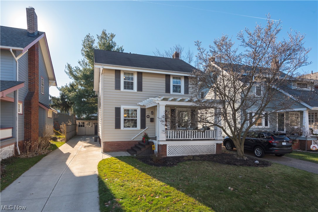 Step into the embrace of comfort in this quaint 3-bed, 1-bath home. Every nook whispers of coziness, blending Lakewood's charm with modern convenience. Enjoy lazy days in the inviting backyard or create memories on the porch with your favorite people. Gather around the fireplace in the living room or enjoy meals in the light filled dining room. The eat in kitchen has an abundance of cabinets newer appliances (2022), and an inviting breakfast nook that is surrounded by windows looking out to the park like back yard. Upstairs the bedrooms have ample closet space and fresh carpeting. The updated and spacious bath completes the calm feeling. No ducking is needed in the high-ceilinged basement that has been waterproofed and has ample space for storage. Outside the back yard has a patio and a rear deck and a wooden fence. Lovely and private it is the perfect place to spend the summer. This comfortable and charming home is move in ready and waiting for you.