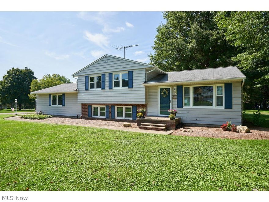 This renovated 3 bedroom 2 bath Cuyahoga Falls split level home is a show stopper. This incredible property is complete with refinished hardwood flooring, open and spacious kitchen, living and dining combination, new windows and so much more. The spacious kitchen offers a large island with brand new cabinetry, gorgeous tile backsplash along with new blue pearl granite counter-tops and new light fixtures. You will also notice that all kitchen appliances are brand new! You will love the custom master bathroom with new vanity and sink, subway tile backsplash, new flooring and light fixtures. The new vinyl deck is a perfect place to sit back and enjoy the large backyard. There is a two-car attached and a two-car detached garage, which make this home complete.