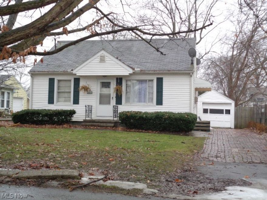 Super cute Cape Cod in the heart of Barberton! Features include vinyl siding, new furnace, new storm and entry door on the front and a large eat-in kitchen! There are hard wood floors under the carpet. Nice sized rooms and generous closet space finish out the wonderful amenities this home has to offer.  Call today for your private showing!