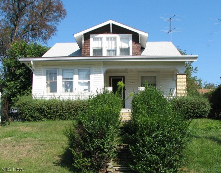 Lots of potential in this spacious Canton bungalow with two first floor bedrooms and 2-3 on the second floor.  Hardwood under most of the carpeting. Large living room with decorative fireplace.  Definitely a fixer upper, but priced accordingly.  In a neighborhood of well-kept homes.