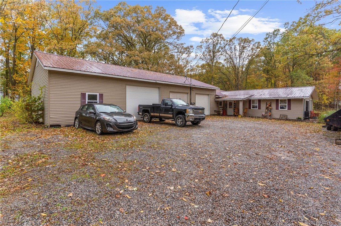 If you're looking for a ton of space, a private pond, plenty of land to grow, you have found it. Not only does this spacious home offer lovely views, but the 3-bay attached garage is a dream!  You can even fit a semi in it! This ranch style home offers an updated kitchen, spacious living room with a sliding glass door overlooking the pond, and 8.8580 acres of peace and tranquility. Located in the coveted Maplewood school district, and close to freeway access, this home offers everything you've been looking for in a private setting! Book your appointment to see this one today before it's gone. Drone footage for aerial views will be uploaded this weekend.