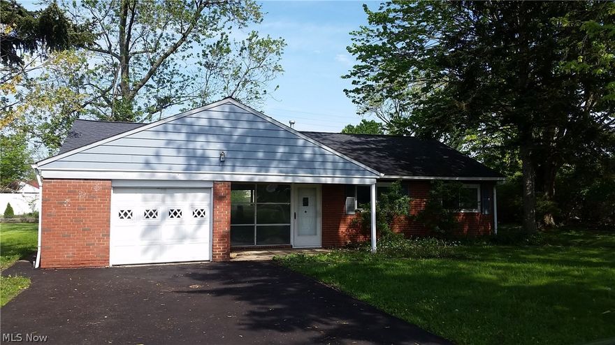Nice brick 3-bedroom ranch with fresh paint and new carpet throughout! Large back patio for outdoor relaxing and a sizeable yard, new asphalt driveway.   Newer Roof & Vinyl Windows.