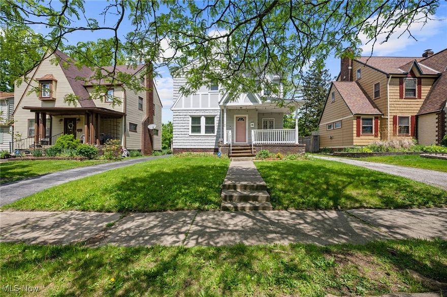 Welcome to 1047 Hillstone Road—a beautifully updated Colonial nestled in the heart of Cleveland Heights. From the inviting front porch and cheerful pink door to the thoughtful upgrades throughout, this home blends classic charm with modern comfort. Inside, you'll find a sunlit living room, a formal dining room with original built-ins, and a renovated kitchen featuring white shaker cabinets, granite countertops, stainless steel appliances, and fresh tile flooring that flows into a spacious eat-in area. A stylish powder room completes the main level. Upstairs, a bright three-season sleeping porch greets you at the top of the stairs, leading to a hallway with classic built-in cabinetry and an elegantly remodeled full bath with Carrara-inspired tile and updated fixtures. The primary bedroom offers a peaceful retreat, complemented by two additional bedrooms. The finished third-floor loft adds flexible space for an office, playroom, or guest suite. Some recent improvements include new flooring, lighting, plumbing, paint, exterior touch-ups, gutter work, and a newly installed rear walkway. The backyard is ideal for entertaining, and a two-car detached garage adds convenience. Just minutes from Coventry Village, Cedar Lee, Cain Park, and Lake View Cemetery, this home offers timeless style, modern updates, and an unbeatable location.