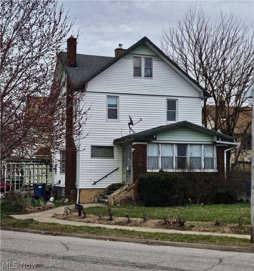 Check out this cozy three bedroom colonial, ideal for both homeowners and investors. Resting on a quiet street across from a playground, this home features a living room with built-in shelves, a closed-in front porch, and partially finished basement with a built-in bar and half bath. Needs updates. Property being sold as-is. Vehicle can be included as chattel purchase.