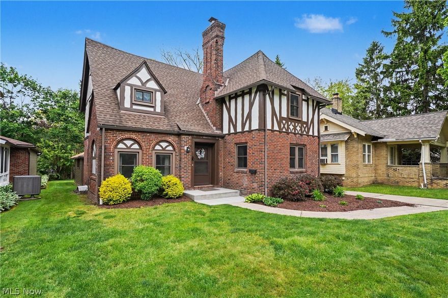 Visit this Exceptional Brick English Tudor Home situated in the Beautiful sought after Castle Park Neighborhood in West Akron. Sellers have updated and cared for this home since purchasing 20 years ago. Important updates include: Updated Kitchen in 2023 that included New Cabinet Doors, rebuild of all drawers, shelving, backsplash, beautiful Luxury Laminate Flooring, Microwave and Dishwasher. Other Stainless Appliances new in 2018. In 2023 same contractor remodeled 2nd Floor Bath with cutting edge materials. Same flooring as in kitchen was added to den/library. In 2024 Sellers tackled the finished basement with updates that included: remodel of full bath, replacement of drop ceiling, repainting and beautful plush carpeting, Plus, the newer Front loader Washer & Dryer are included in sale, along with all 2nd floor standing A/C units. Other improvements include: All Windows replaced in 2019 with quality Okna 800 series Windows. Dunrite Roof in 2014, Backyard Fencing in 2022, Upper part of exterior and garage repainted in 2025, along with full maintenance of living Room fireplace. In 2026 Living Room repainted and new Ceiling fans w/remotes added in Bedrooms. New Electrical Box in 2025. There's a breezy 3 Season Room between house &  2 Car Attached Garage. This Spectacular Home is ready to move in with Immediate Possession!