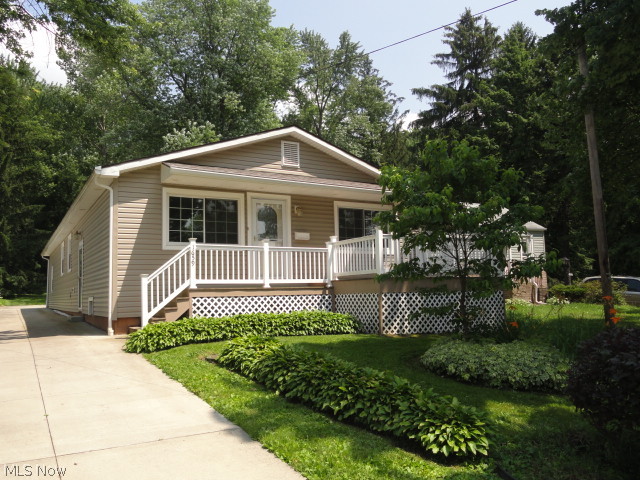 Fantastic open floor plan! 3 B/2BA Ranch completely updated in 2012! New windows, siding, furnace, AC and electric. New kitchen cabinets, granite counters, laminate and carpet, new appliances too! And if that wasn't enough, this home has a deep wooded lot, wood deck, concrete drive, finished basement with Family room, Media room, 2nd Full bath with steps up to an attached 2+ car heated garage. Wow! Nice street, close to Chapel Hill Mall.
