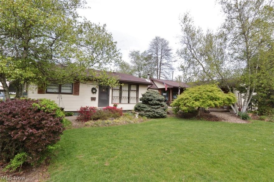 Beautiful northend home that is over 2200 sq. ft and has a large addition that would make a phenomenal family room or additional bedrooms. Also think about converting the studio to an in law suite! Enjoy the added advantage of a partially finished basement, and double lot within close distance to shopping, hospital, schools and other conveniences. This home has hardwood oak flooring, newer roof (3 years old!) large cedar deck overlooking a nice wooded lot. High efficiency Rheem gas furnace plus central air.  Basement has  an additional bathroom and media/family room. House has a whole house water filter. This is great square footage and usable space for the price!!