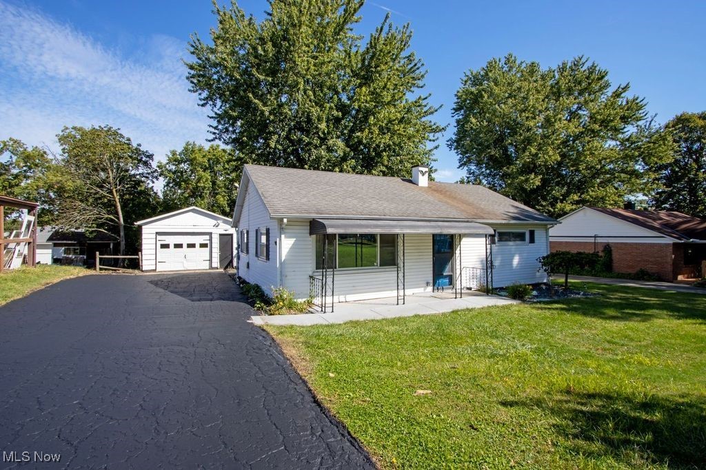 Welcome to 1997 Hout Road in Mansfield, a beautifully renovated ranch home that is completely move-in ready. This charming 3 bedroom, 1 bath property offers 864 square feet of thoughtfully updated living space, featuring custom Amish-built kitchen cabinets, sleek newer appliances, and fresh modern finishes throughout. A brand new heat pump and central air conditioning provide comfort in every season, while the spacious fenced-in backyard is ideal for entertaining, pets, or play. With a detached one-car garage, a freshly sealed driveway, and inviting curb appeal, this home combines style, convenience, and functionality in a desirable location—perfect for first-time buyers, those looking to downsize, or anyone seeking a turnkey home.