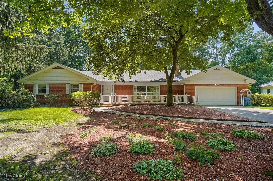 Welcome to this well-maintained ranch-style home featuring 3 bedrooms, 3 full bathrooms, and 2,352 square feet of living space, situated on a spacious and private 1.98-acre lot. This property offers a thoughtful layout and a variety of functional features suited to a range of living needs. The main level includes hardwood flooring throughout, a bright and open living area, and generously sized bedrooms. The kitchen, dining, and living spaces are connected for comfortable day-to-day living and entertaining. In addition to the 2-car attached garage, the property includes a 2-car detached garage, offering additional space for vehicles, storage, or workspace. The partially finished basement provides multiple rooms that can be used for a home office, fitness area, recreation space, or additional storage. There is also convenient garage access from the basement level. A whole-home backup generator is installed, providing added reliability during power outages. This property combines indoor comfort, practical amenities, and outdoor space—all in a quiet, rural setting with room to personalize. Call today to schedule a showing and see this beautiful ranch.