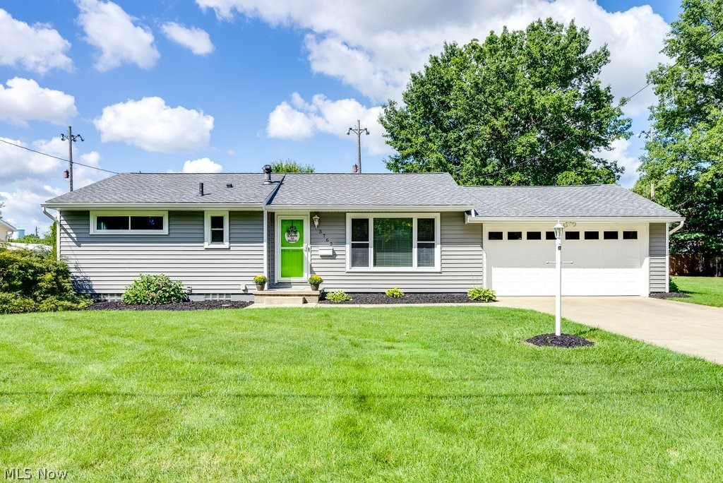 Pride of Ownership is apparent in this Stow Ranch Home! The home has 3 bedrooms and 1 full bath with an attached 2 car garage. There are hardwood floors in the living room and bedrooms. The eat-in kitchen was updated in 2015 with new flooring and beautiful tile back splash. All the appliances will stay. The basement has been finished for extra living space, new carpet and glass block windows were added as well. There is also a laundry area with washer and dryer. Plenty of extra space for storage too. Let's not forget the 24X28 SECOND garage! There is unlimited potential for this space, store your cars or use it as a workshop with 220V service. Extra care has been added to the lawn and land scaping. The lot is oversized and the backyard has a patio and fire pit for entertaining. Updates include roof and siding 2020. Furnace, AC, windows, new garage floor, ceramic bathroom tile, front walkway and step, 2011. The swing set will stay. The basement water proofing was done by Ohio state wa