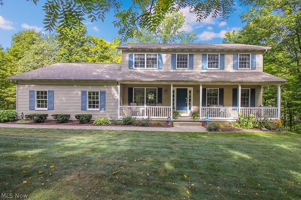 Looking for a home with a wooded, private setting? Look no more! This fabulous front porch colonial sits on 3.41 wooded acres with amazing scenic views! This home features many updates: Hardwood flooring in dining room, foyer and living room; kitchen with granite counters, center island, two pantries; all new black stainless appliances and ceramic tile flooring; first floor office; formal dining room with trayed ceiling; gorgeous brick (gas) fireplace; updated electrical fixtures, ceiling fans and plumbing fixtures throughout; huge master suite with vaulted ceiling, updated master bath and jetted tub; and much fresh paint and newer carpet. The back yard is a great place to relax or entertain on the multi-level deck or in the above ground pool with salt water chlorination – great views everywhere! Other major updates: Roof 2012; Furnace and a/c 2016; HWT 2017; and new slider door in basement! Got cars or need extra storage space? – There’s a 24’X24’ barn with concrete floor and double overhead door plus a full second floor – two additional cars can easily fit in here! Convenient to Hinckley Reservation, hiking trails and Whipps Ledges! Hinckley Twp has NO city tax! Hurry – this won’t last – Call Today for your private showing!