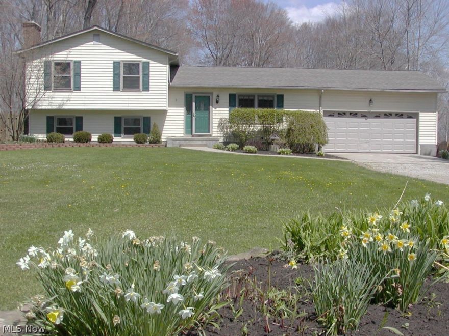 Lot: 97.X 573. Wow What a great 4 level split on over one acre in the city. 3 possible 4 bedrooms. Vaulted ceiling in huge sunken living/family room  with fireplace insert and French doors to the spacious yard, deck & private fenced lot.  Family room in lower level with second fireplace. Large applianced kitchen with maple cabinets.  Jacuzzi tub in lower bath. 24 X 32  2nd garage with 12 foot ceiling plus attached two car garage. 31 X 31 barn with loft. Office off the foyer & eating area. Backs up to Fox Den Golf Course. America's Preferred Home Warranty included.Special assessment is $61 per year for sewer maintenance, continuous.